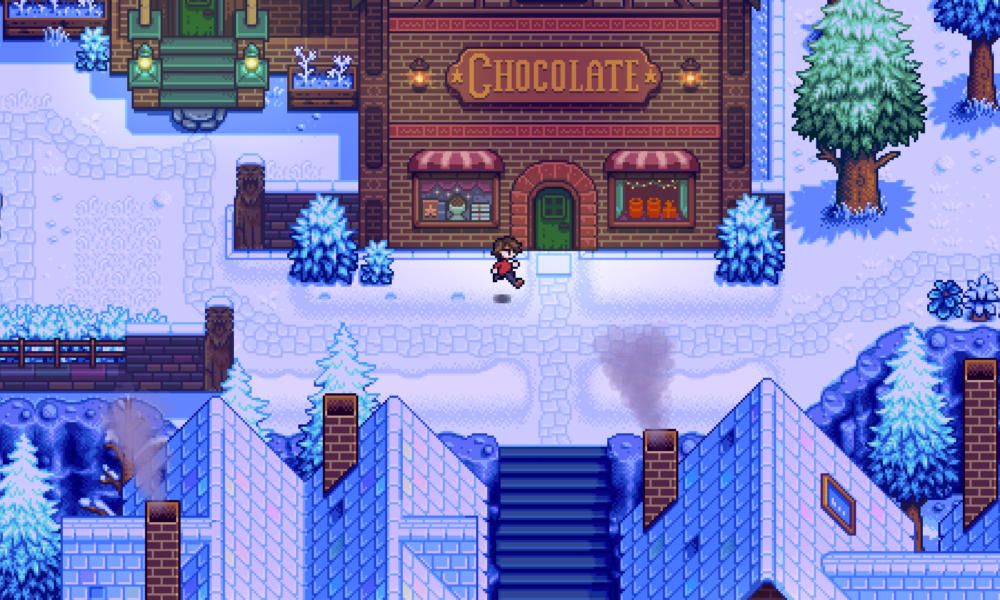Vue en pixel art de Haunted Chocolatier montrant une chocolaterie dans un village enneigé, futur jeu d’Eric Barone.