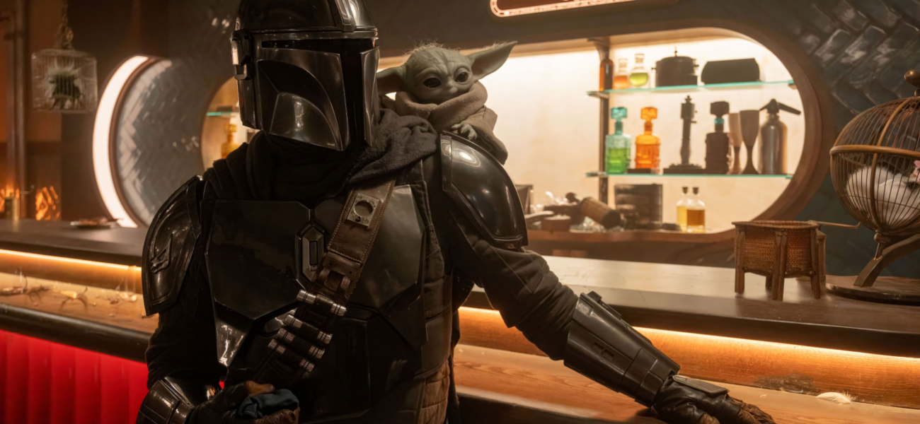 Din Djarin et Grogu dans un bar galactique dans The Mandalorian and Grogu film Star Wars 2026
